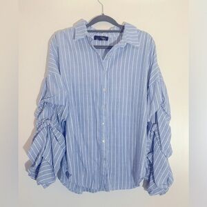 Suzanne Beatro women’s button down with dramatic sleeves